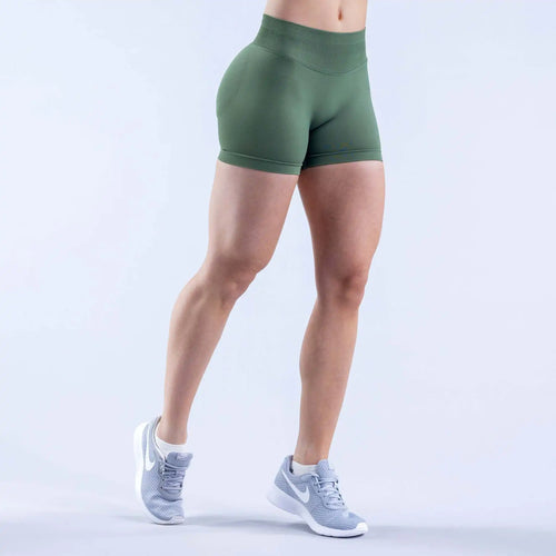 High waist seamless pistachio green colored impact gym shorts with Scrunch Fit to shape and define the booty pump