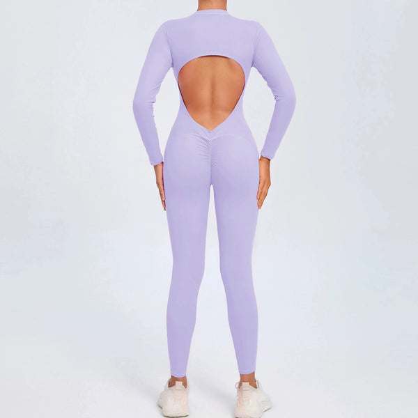 Pastel purple backless long sleeve sports jumpsuit with front zipper designed for extreme comfort and confidence in the gym by allowing you to show off that pumped back