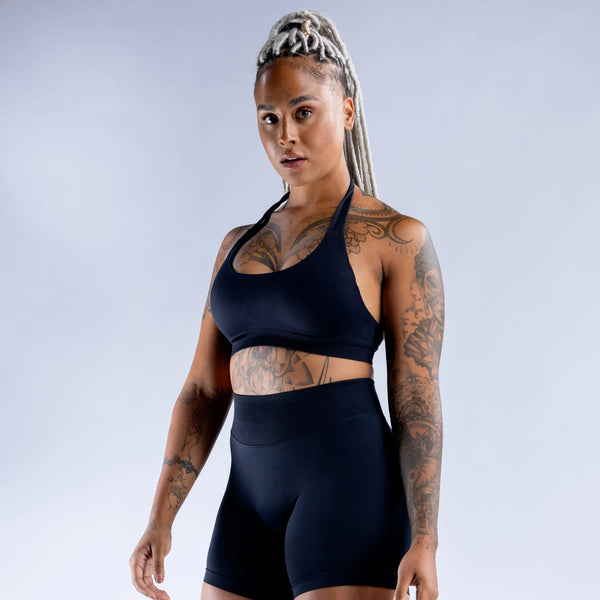 Black impact sports bra designed to comfortably hug and hold, its backless design allows you to show of that vicious lat pump during upper body training days