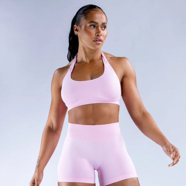 Pink impact sports bra designed to comfortably hug and hold, its backless design allows you to show of that vicious lat pump during upper body training days