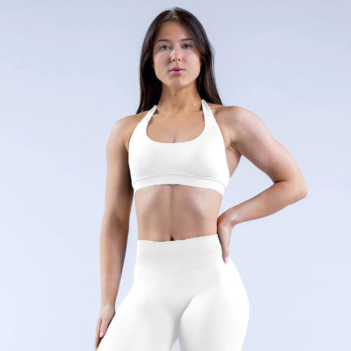 White impact sports bra designed to comfortably hug and hold, its backless design allows you to show of that vicious lat pump during upper body training days