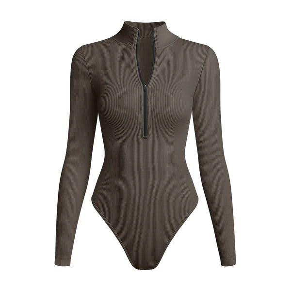 Tealeaf ribbed sleeved high-neck sports bodysuit with front zipper designed for extreme comfort and confidence in the gym allowing for huge freedom of movement during training